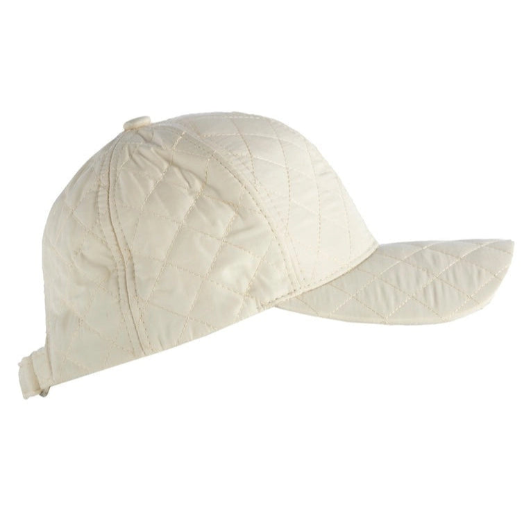 Ivory quilted baseball cap on a white background