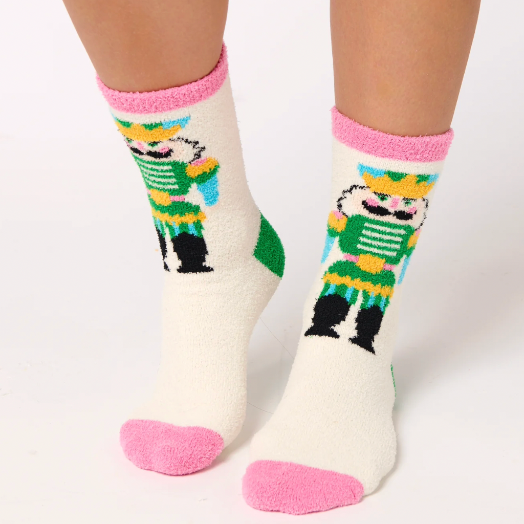 White womens fuzzy nutcracker socks pink green blue yellow and black