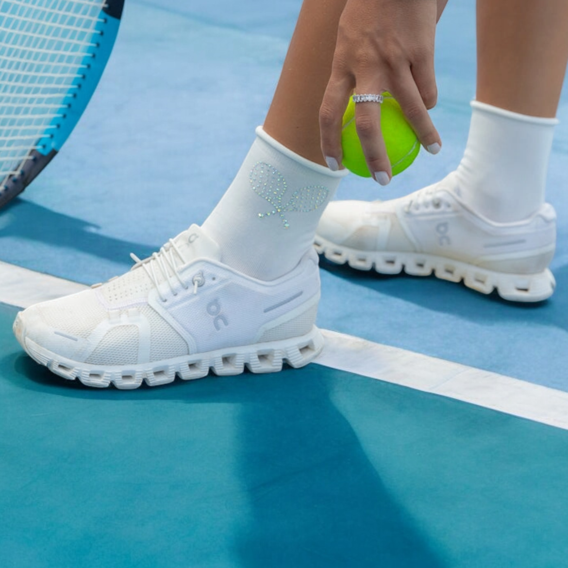 White women's rhinestone tennis socks with a sparkling tennis racquet design, perfect for tennis lovers and players