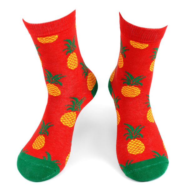 Women's Pineapple Crew Sock. Red sock with green toe and heel. Pineapple pattern allover.
