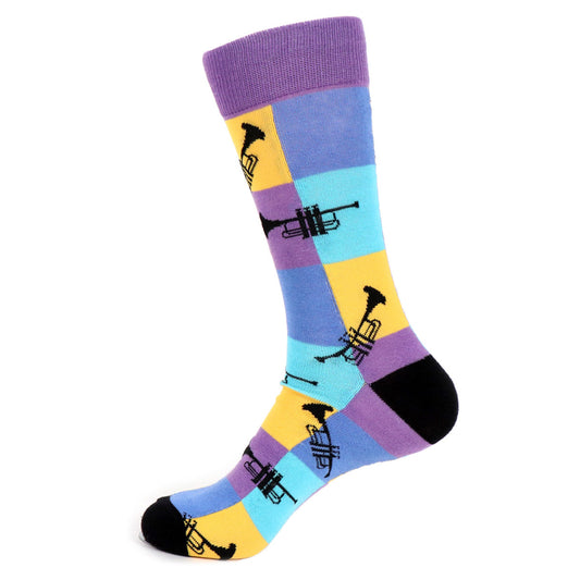 A pair of men's socks with a colorful striped pattern in shades of blue, purple, yellow, and black featuring multiple trumpet graphics.