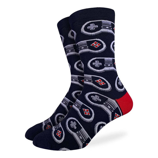 A pair of navy blue crew socks with a pattern of classic retro video game controllers and a red heel.