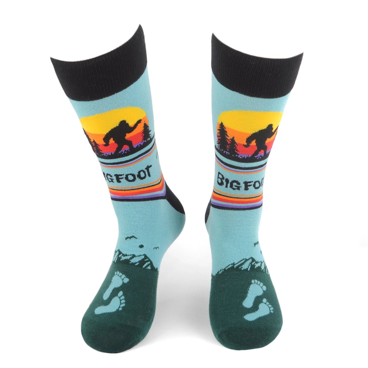 Men's crew socks with Bigfoot silhouette, footprints, mountains and a colorful stripes.